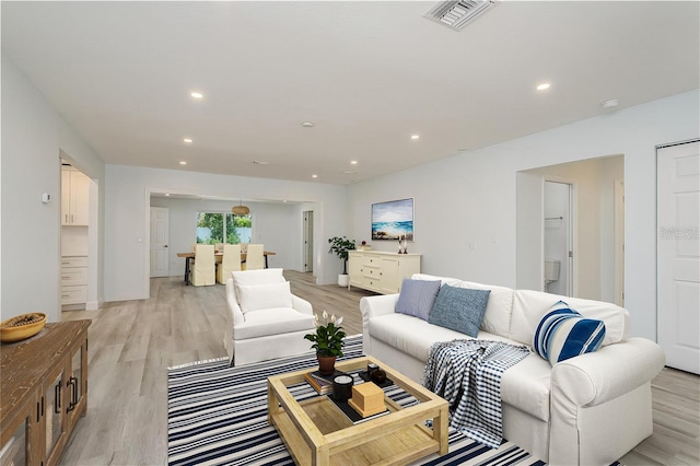 1152 Jackmar Rd, Dunedin, FL 34698 - living room with light wood-type flooring and recessed lighting