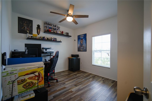 office with a ceiling fan and wood finished floors