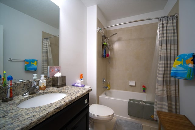full bath with toilet, shower / tub combo with curtain, and vanity