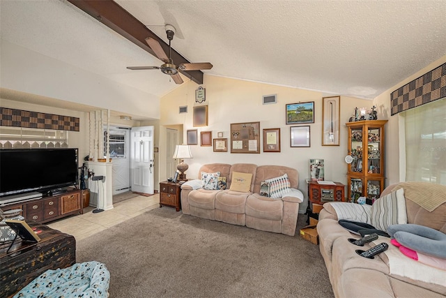 616 Highview Cir S, Brandon, FL 33510 - living room featuring ceiling fan, carpet flooring, a textured ceiling, and tile patterned floors