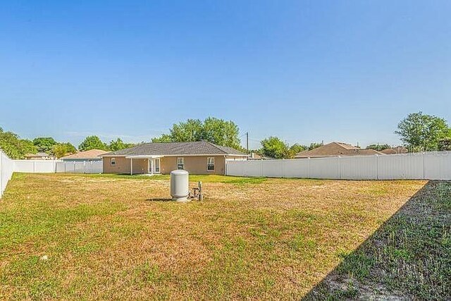 1 Pecan Course Cir, Ocala, FL 34472 - view of yard with a fenced backyard