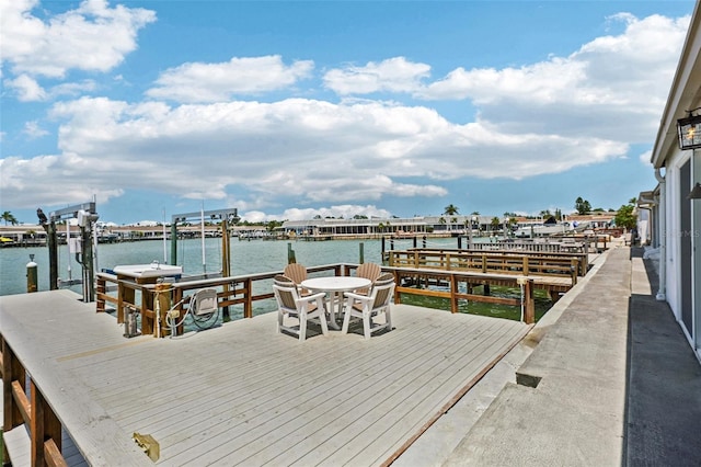 view of dock with a water view and boat lift