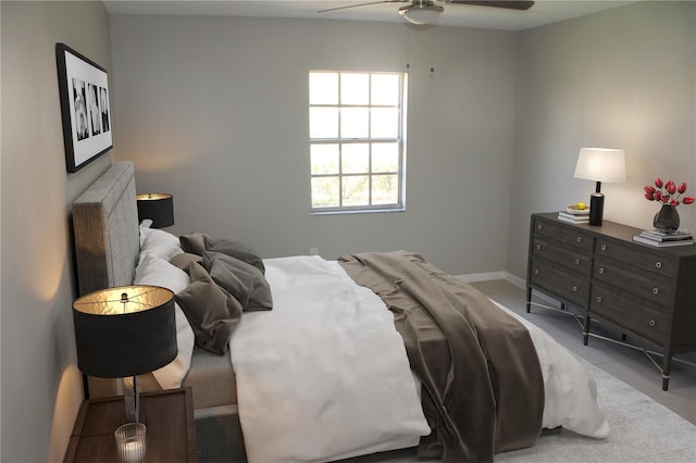 bedroom featuring baseboards, a ceiling fan, and carpet flooring