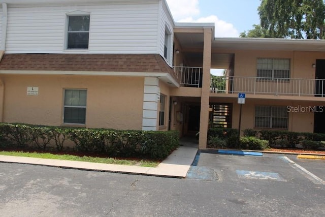 4725 Joseph Ct Unit 233, Tampa, FL 33614 - view of building exterior with uncovered parking