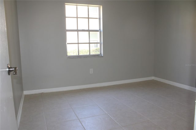 4725 Joseph Ct Unit 233, Tampa, FL 33614 - unfurnished room with tile patterned flooring and baseboards