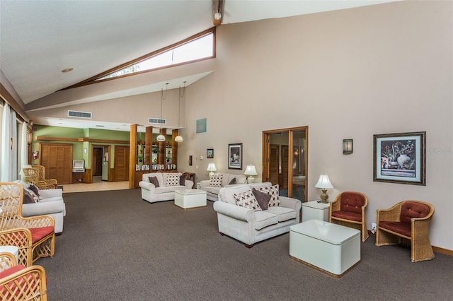 living area featuring carpet flooring and high vaulted ceiling