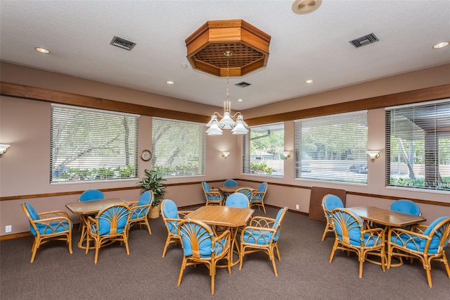 dining area with carpet flooring and recessed lighting