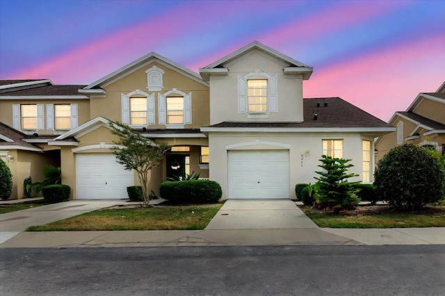 6260 Olivedale Dr, Riverview, FL 33578 - view of front of house featuring stucco siding, an attached garage, concrete driveway, and roof with shingles
