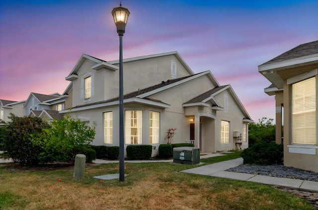 6260 Olivedale Dr, Riverview, FL 33578 - view of front of house featuring stucco siding and a yard