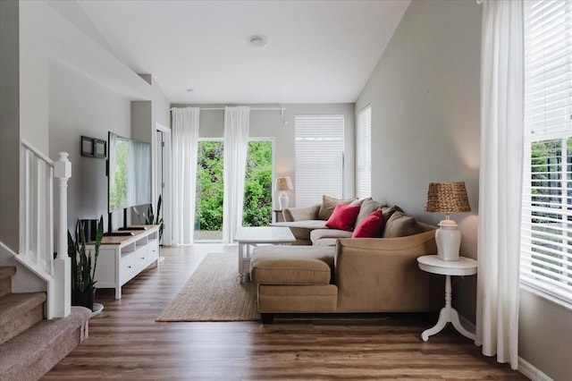 6260 Olivedale Dr, Riverview, FL 33578 - living area featuring plenty of natural light, stairs, and dark wood-style floors