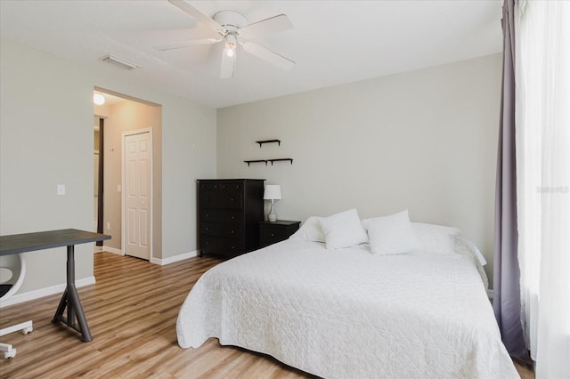 6260 Olivedale Dr, Riverview, FL 33578 - bedroom featuring wood finished floors, baseboards, and a ceiling fan