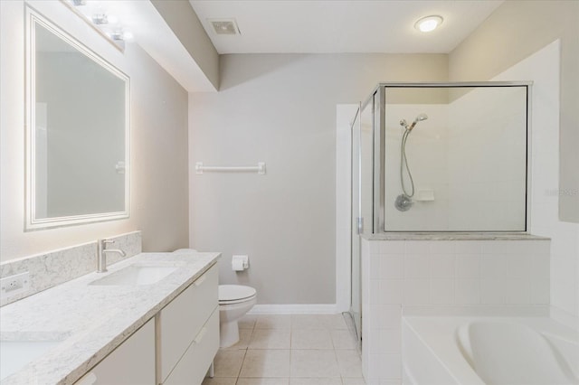 6260 Olivedale Dr, Riverview, FL 33578 - full bathroom featuring tile patterned floors, a shower stall, toilet, a bath, and double vanity