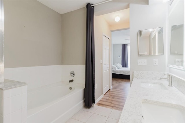 6260 Olivedale Dr, Riverview, FL 33578 - bathroom with tile patterned floors, a garden tub, ensuite bathroom, and double vanity