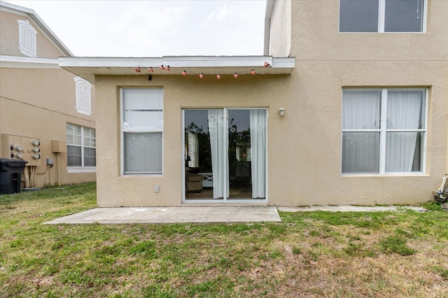 6260 Olivedale Dr, Riverview, FL 33578 - rear view of property with stucco siding and a yard