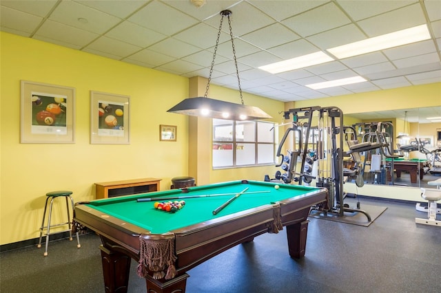 game room with pool table and a paneled ceiling