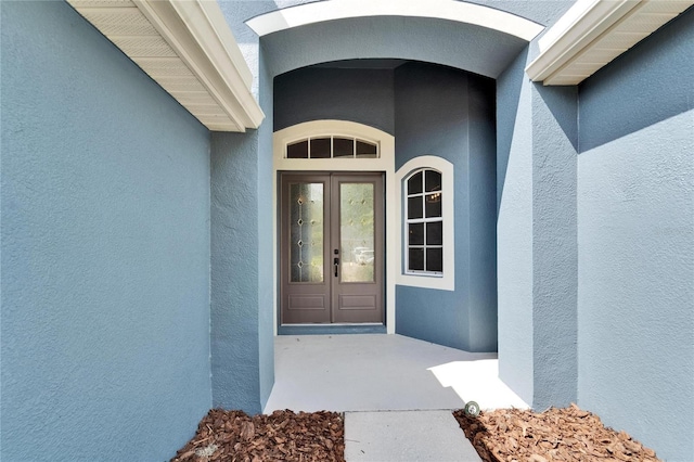 16516 Bridgewalk Dr, Lithia, FL 33547 - entrance to property with stucco siding and french doors