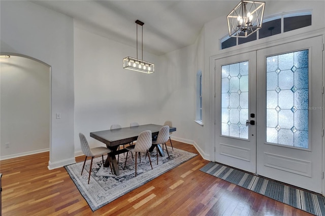 16516 Bridgewalk Dr, Lithia, FL 33547 - foyer with wood finished floors, french doors, baseboards, and a notable chandelier