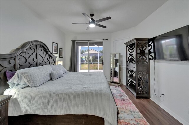 16516 Bridgewalk Dr, Lithia, FL 33547 - bedroom with baseboards, dark wood-type flooring, a ceiling fan, and access to exterior