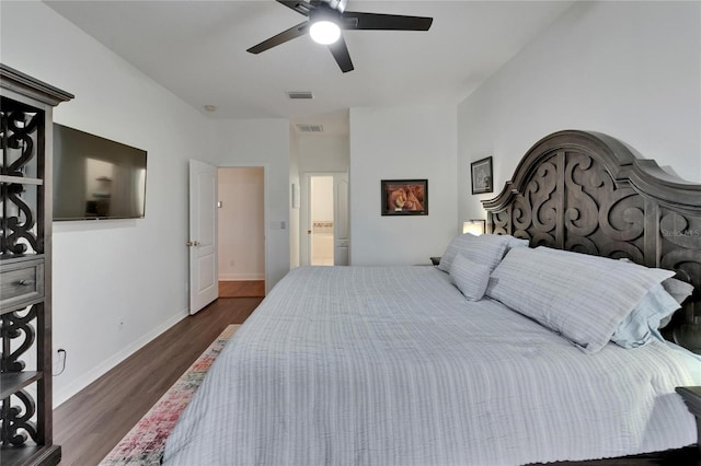 16516 Bridgewalk Dr, Lithia, FL 33547 - bedroom with baseboards, visible vents, a ceiling fan, and wood finished floors