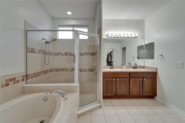 16516 Bridgewalk Dr, Lithia, FL 33547 - bathroom featuring a stall shower, a garden tub, double vanity, and a sink