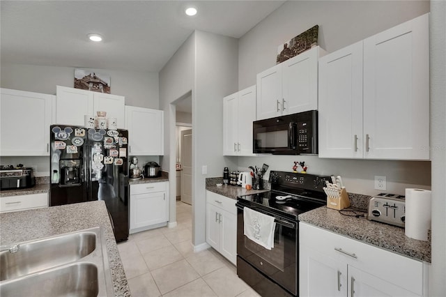 11707 Sunburst Marble Rd, Riverview, FL 33579 - kitchen with black appliances, white cabinets, a sink, light tile patterned flooring, and recessed lighting