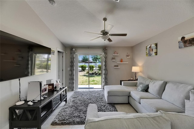 11707 Sunburst Marble Rd, Riverview, FL 33579 - living area with ceiling fan, tile patterned flooring, and a textured ceiling