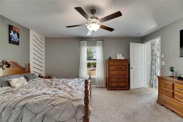 11707 Sunburst Marble Rd, Riverview, FL 33579 - bedroom with light colored carpet, a textured ceiling, and ceiling fan