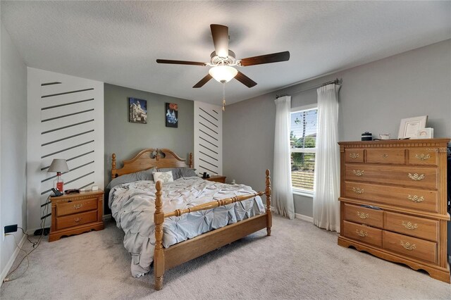 11707 Sunburst Marble Rd, Riverview, FL 33579 - bedroom featuring light carpet, baseboards, and ceiling fan