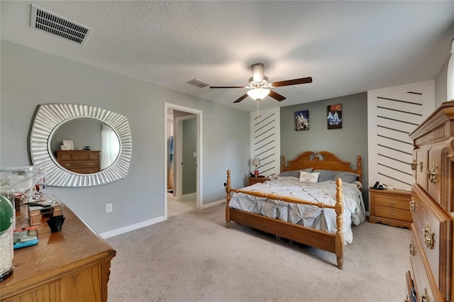 11707 Sunburst Marble Rd, Riverview, FL 33579 - bedroom featuring light colored carpet, a ceiling fan, and baseboards