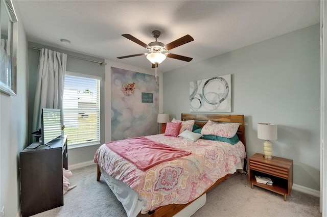11707 Sunburst Marble Rd, Riverview, FL 33579 - carpeted bedroom with baseboards and a ceiling fan