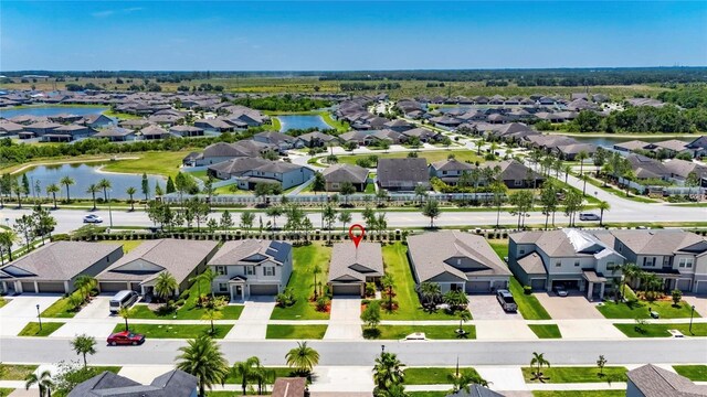 11707 Sunburst Marble Rd, Riverview, FL 33579 - aerial view of residential area with a large body of water