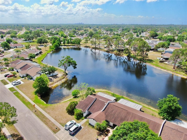 aerial view featuring a water view and a residential view