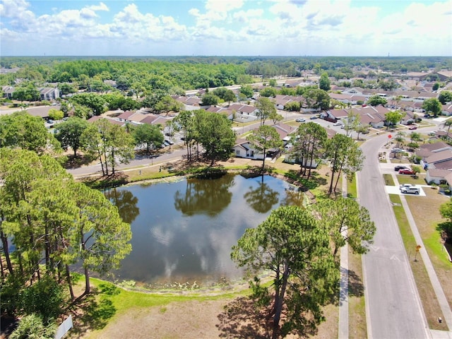 bird's eye view with a water view and a residential view