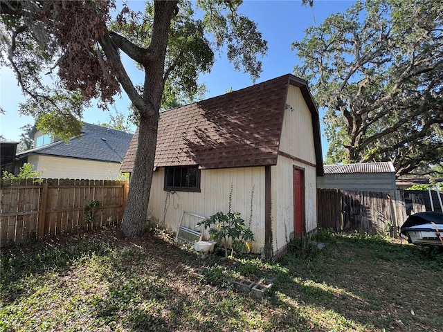 1703 N Taylor Rd, Brandon, FL 33510 - view of outbuilding featuring an outdoor structure and a fenced backyard