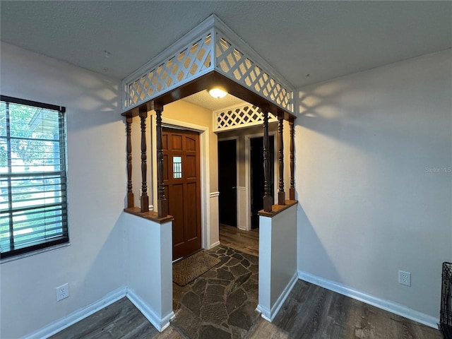 1703 N Taylor Rd, Brandon, FL 33510 - corridor with baseboards and wood finished floors