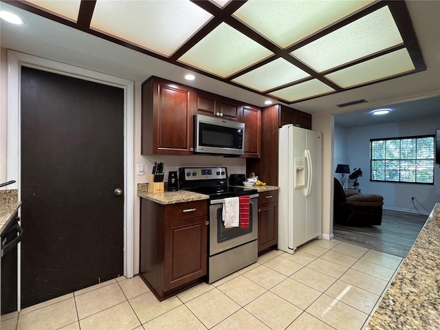 1703 N Taylor Rd, Brandon, FL 33510 - kitchen featuring visible vents, light tile patterned floors, baseboards, stainless steel appliances, and recessed lighting
