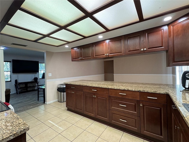1703 N Taylor Rd, Brandon, FL 33510 - kitchen featuring light stone counters, recessed lighting, and dark brown cabinets