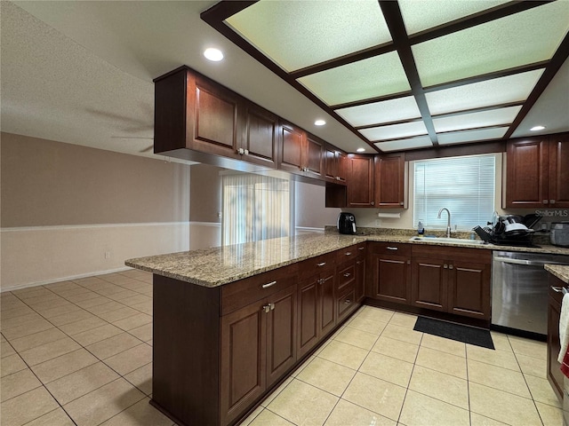 1703 N Taylor Rd, Brandon, FL 33510 - kitchen with light tile patterned floors, stainless steel dishwasher, a peninsula, and a sink