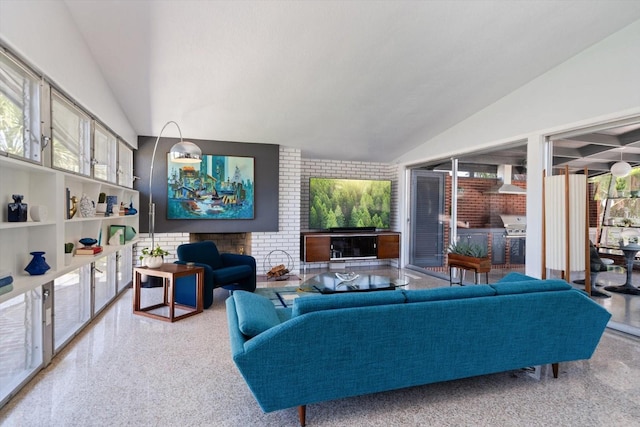 living room featuring a healthy amount of sunlight and lofted ceiling
