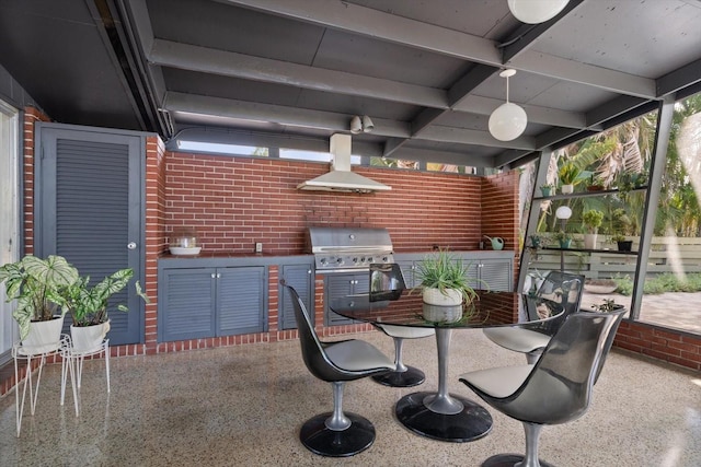 view of patio / terrace featuring outdoor dining space and grilling area
