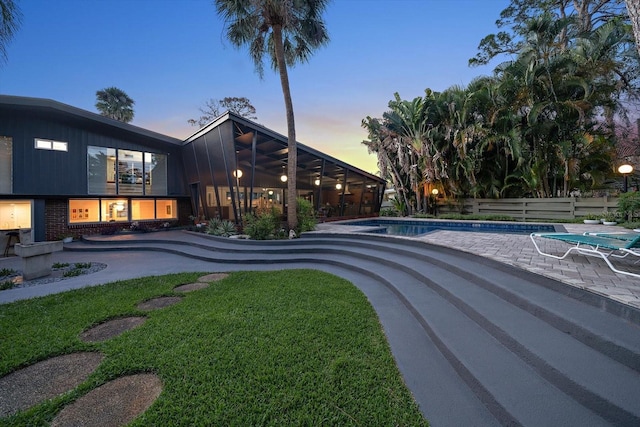 outdoor pool featuring a patio