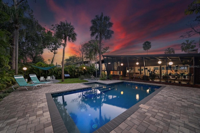 pool with a patio area