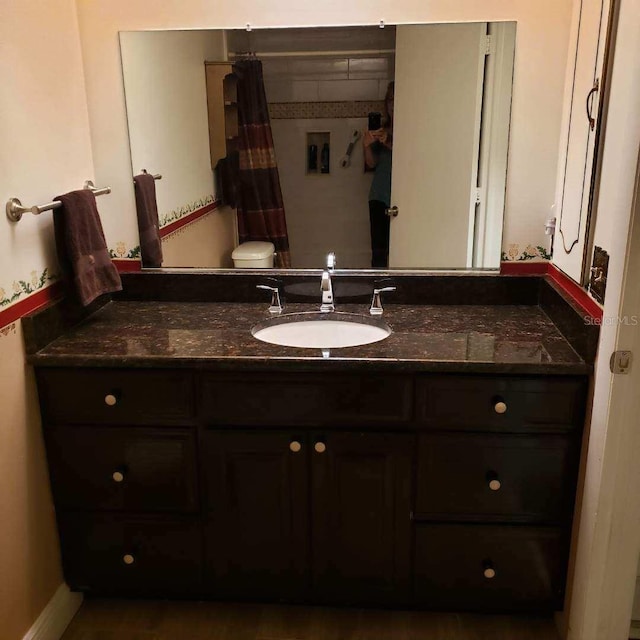 bathroom with vanity and a shower with curtain