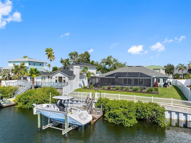 6604 Dolphin Cove Dr, Apollo Beach, FL 33572 - back of property with boat lift, a water view, and stairs