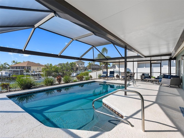 6604 Dolphin Cove Dr, Apollo Beach, FL 33572 - outdoor pool featuring a patio, outdoor lounge area, a residential view, and glass enclosure