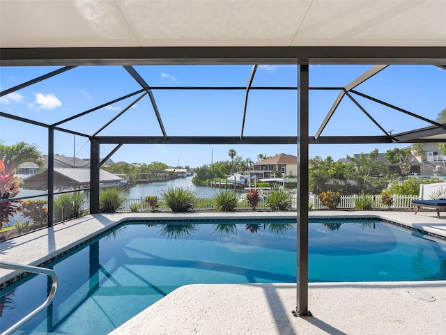 6604 Dolphin Cove Dr, Apollo Beach, FL 33572 - outdoor pool with a water view, glass enclosure, and a patio area