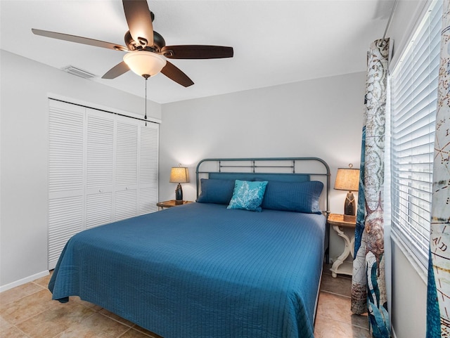 6604 Dolphin Cove Dr, Apollo Beach, FL 33572 - bedroom with a closet, ceiling fan, and baseboards