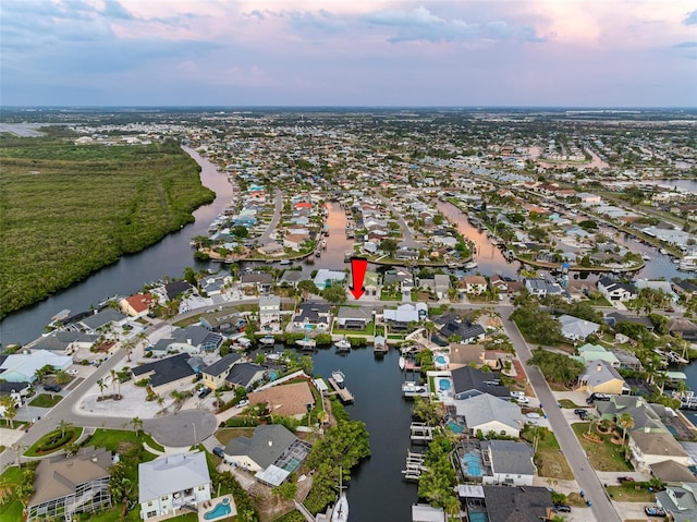 6604 Dolphin Cove Dr, Apollo Beach, FL 33572 - aerial view of property's location featuring nearby suburban area and a nearby body of water