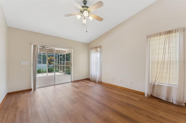 3001 Folklore Dr, Valrico, FL 33596 - spare room with vaulted ceiling, wood finished floors, and a ceiling fan