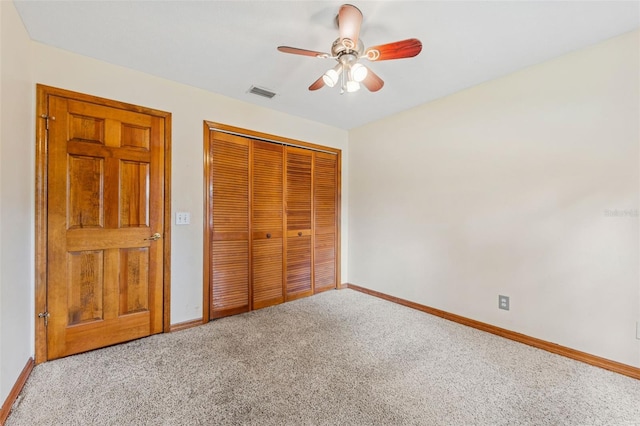 3001 Folklore Dr, Valrico, FL 33596 - unfurnished bedroom featuring carpet flooring, a closet, and a ceiling fan